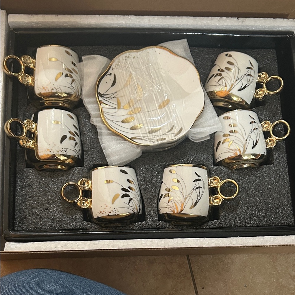 Elegant Gold and Black Tea Set